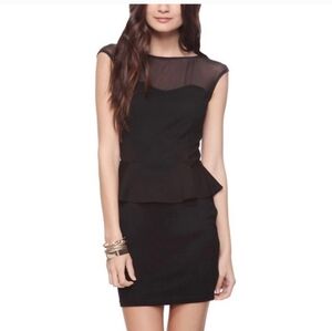 Peplum dress with short  sleeves and sheer bodice